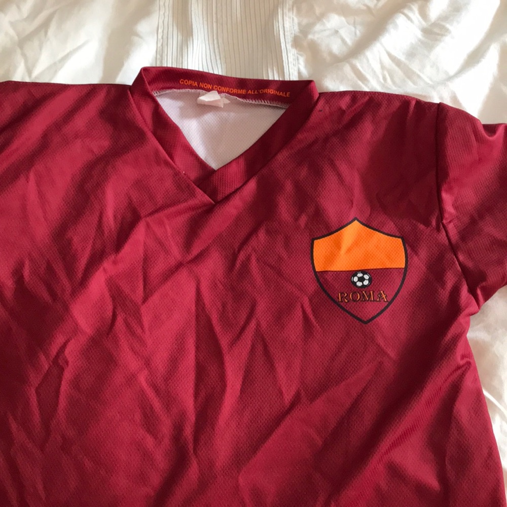 Roma football jersey.